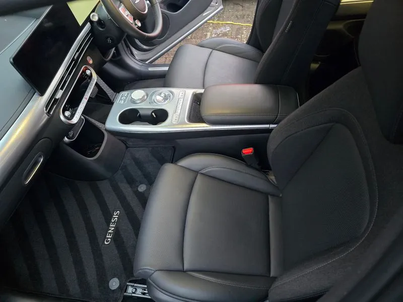 Genesis interior, looking across passenger seat to driver side