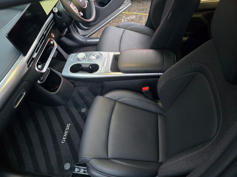 Genesis interior, looking across passenger seat to driver side