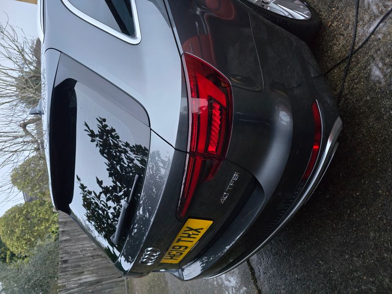 Dark grey Audi 40 TFSI rear view